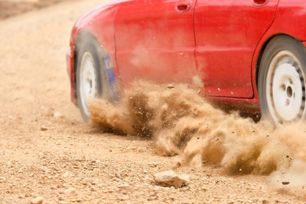 Rally Car speed in dirt track Rally Car speed in dirt track rally car racing stock pictures, royalty-free photos & images