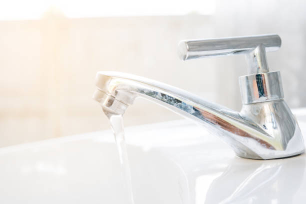 istock close up white sink with faucet 862153738