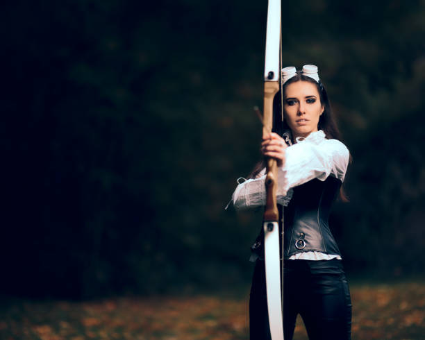 istock Female Archer Warrior in Costume with Bow and Arrow 862153762