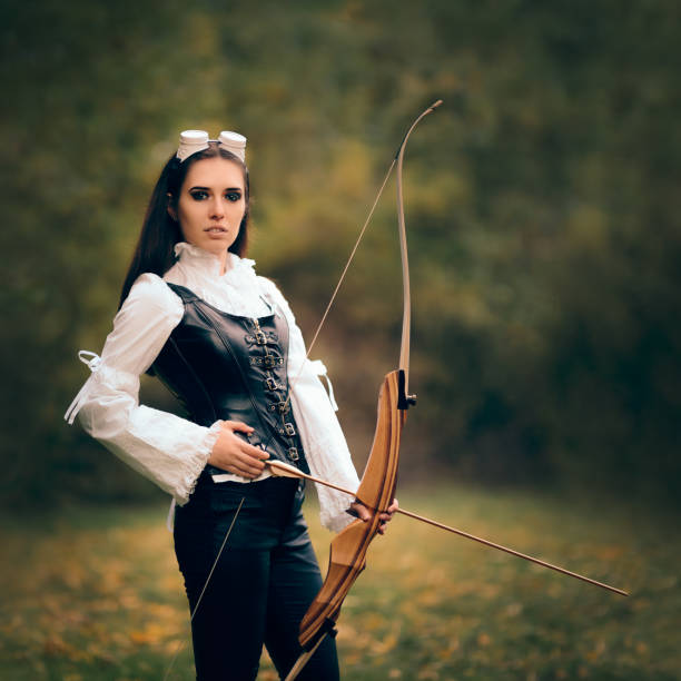 istock Female Archer Warrior in Costume with Bow and Arrow 862153768
