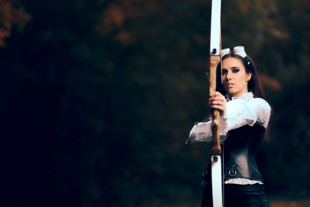 istock Female Archer Warrior in Costume with Bow and Arrow 862153770