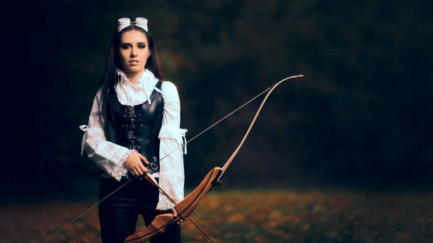 istock Female Archer Warrior in Costume with Bow and Arrow 862153784