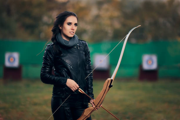 istock Archer Woman with Bow and Arrow in Target  Training 862153786