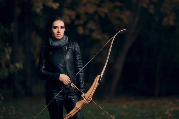 istock Archer Woman with Bow and Arrow in Target  Training 862153792