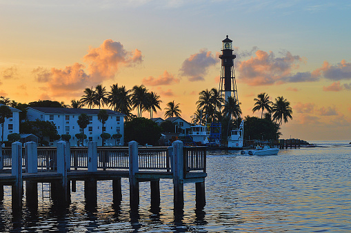 Sunrise behind the Hillsboro Inlet Lighthouse in Pompano Beach, Florida