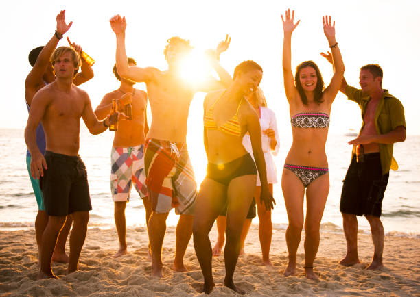 istock A group of diverse people is having fun at the beach 862156230