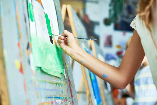 istock Girl Painting in Art Class 862160320
