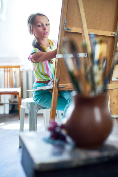 istock Little Girl Studying in Art Class 862160360