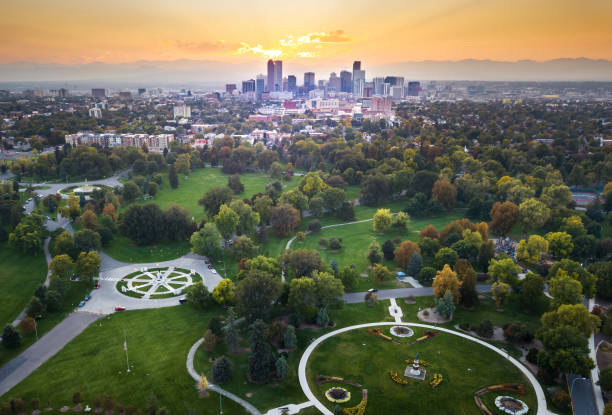 Sunset over Denver cityscape, aerial view from the park Sunset over Denver cityscape, aerial view from the city park denver stock pictures, royalty-free photos & images