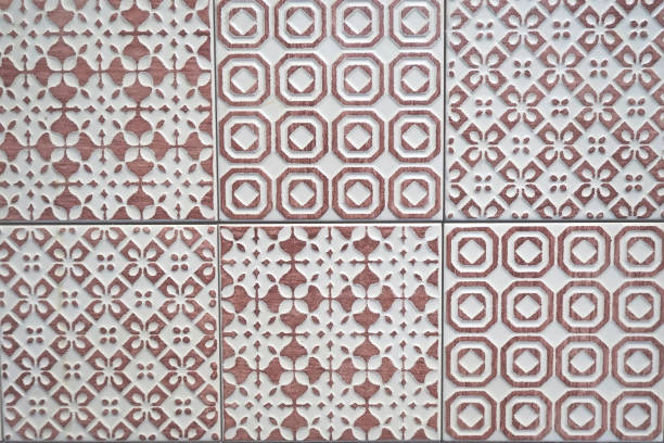 istock White and light purple ceramic tile texture. Seamless pattern with symmetric geometric ornament, abstractly repeated. 862163838