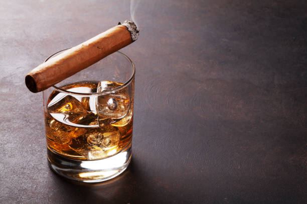 istock Whiskey with ice and cigar 862164106