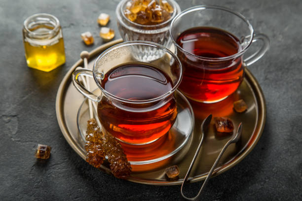 istock tea in glass cup with caramelized sugar 862165108