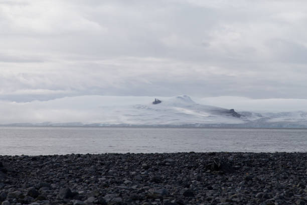 istock An antarctic island in the clouds and fog. 862167702