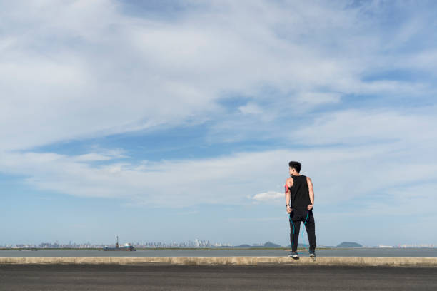 istock young male athlete jumping rope against sky 862167720