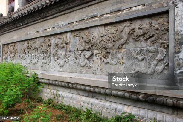 Nine Dragon Wall In A Temple Chinese Ancient Architecture Landscape Stock Photo - Download Image Now