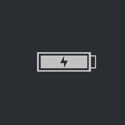 Full charged battery icon on dark background