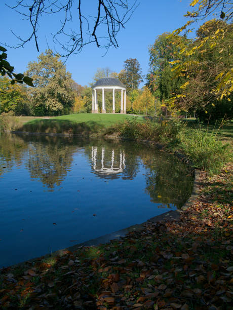 istock White temple with pond in foreground at a public park 862172018