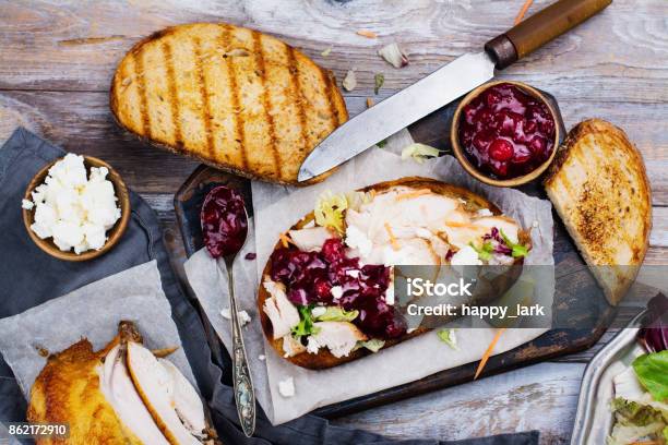 Homemade Turkey Leftover Sandwich With Cranberry Sauce Stock Photo - Download Image Now
