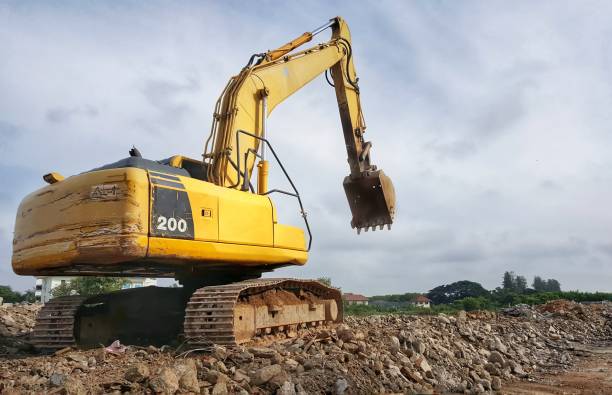 istock backhoe to excavate the soil on the ground 862176806