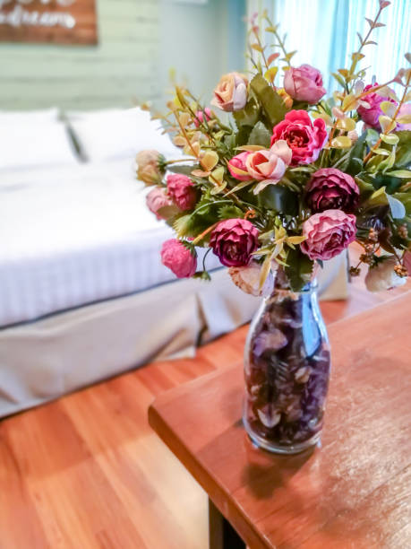 istock Vase of artificial flower decoration on table in modern rustic Bedroom 862179070