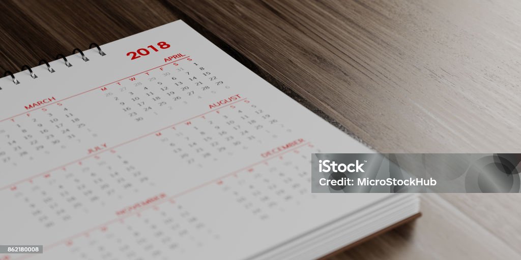 Blanco calendario sobre superficies de madera marrón - Foto de stock de Calendario libre de derechos