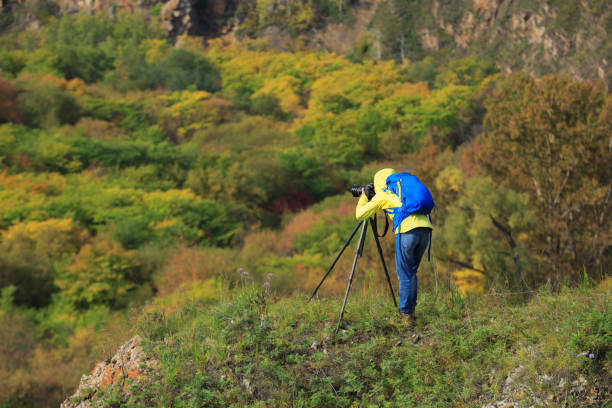 istock Photographer taking photo in beautiful nature 862187470