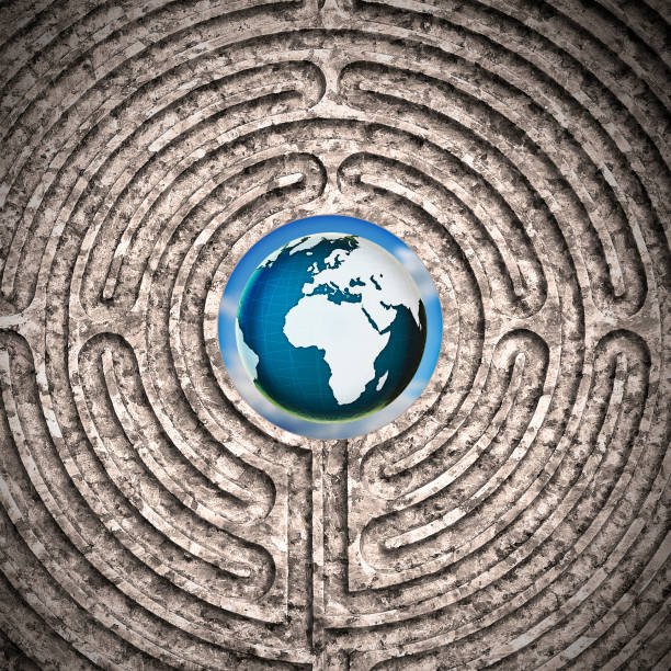 istock The world seen through a labyrinth carved in stone - concept image.