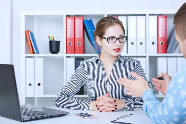 istock Two young coworkers working together in a modern coworking studio. 862189958