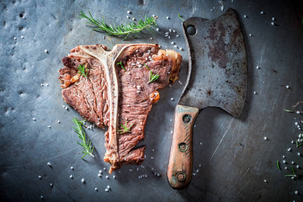 istock Delicious tbone steak with herbs and salt 862190014