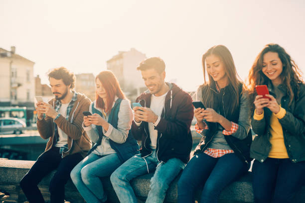 istock People texting in the city 862192304