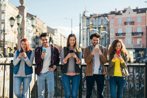istock People texting in the city 862192308
