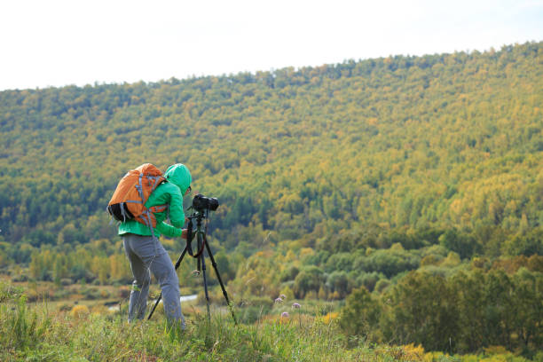istock Photographer taking photo in beautiful nature 862196606