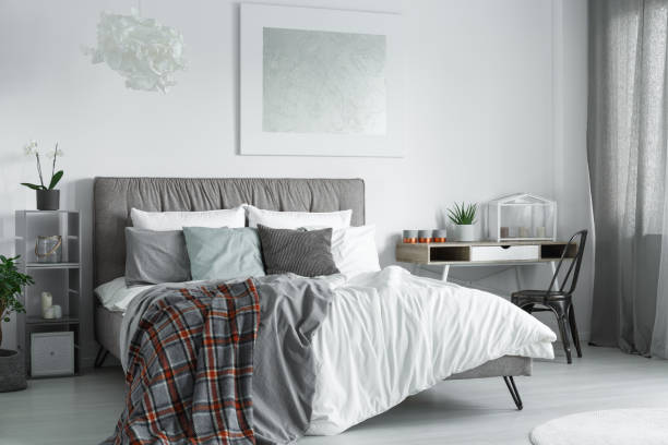 istock Abstract painting hanging over bed 862196774