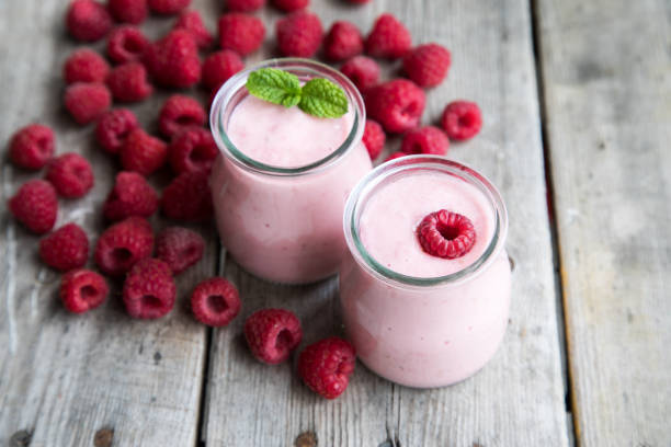 istock Yogurt smoothie with raspberries, fruit dessert. Berry smoothie. healthy dieting concept 862197358