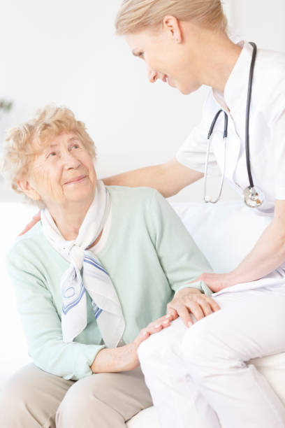 istock Senior woman talking with doctor 862200680