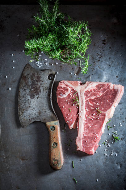 istock Raw t-bone steak with salt and rosemary 862201296