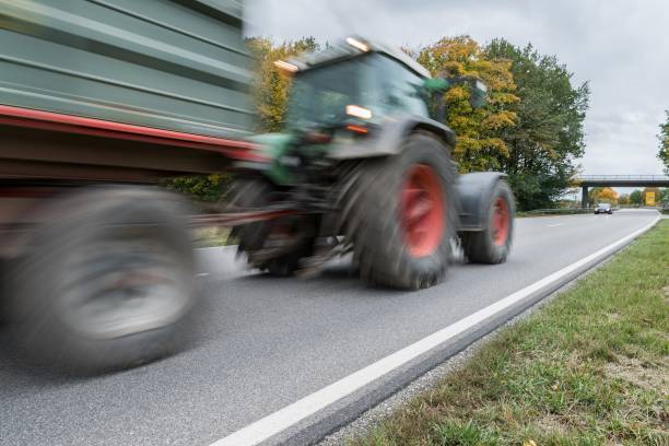 istock Tractor passing by on a national highway, Germany 862201838