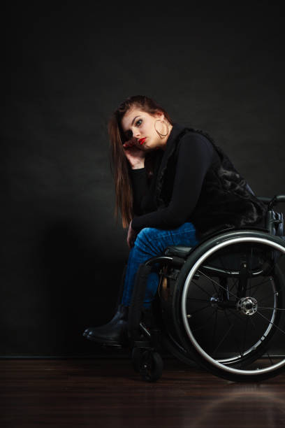 istock Sad girl in a wheelchair. 862202272