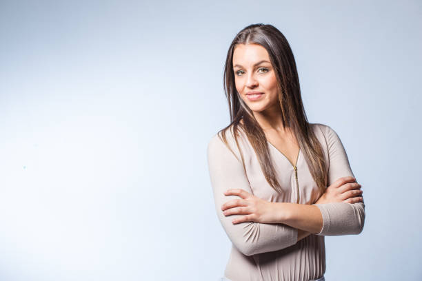 istock Brunette Millenial business woman in a white studio 862208848