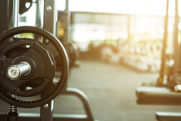 istock Fitness background with dumbbells in gym 862212584