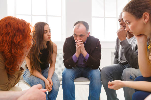 istock Meeting of support group, therapy session 862213046