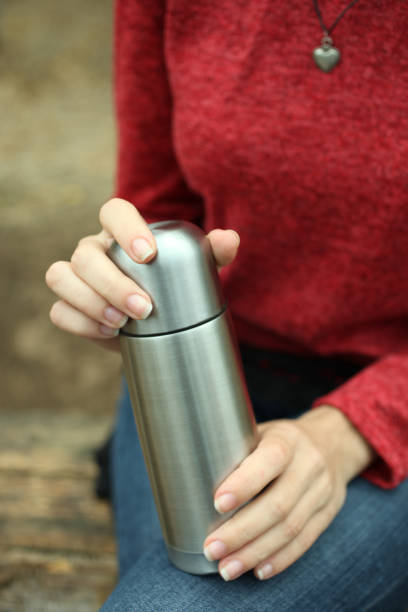 istock girl with a thermos 862216718