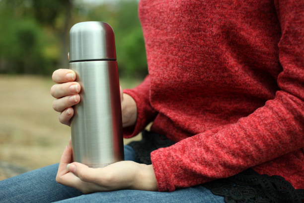 istock girl with a thermos 862216766
