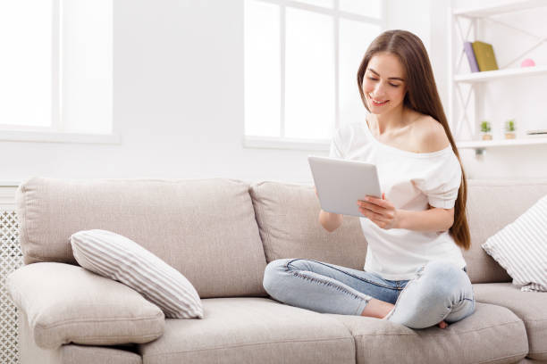 istock Brunette girl at home chatting online 862217276