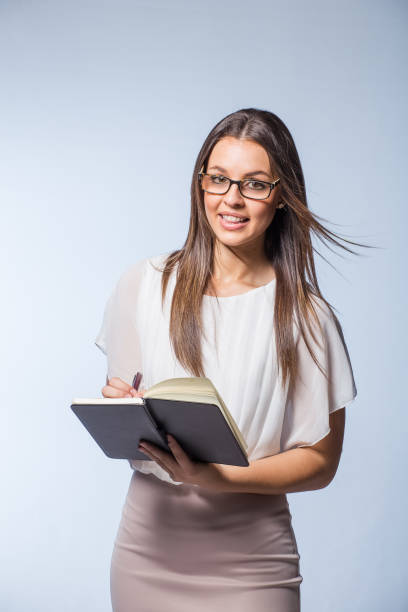 istock Brunette business / professional model wearing reading glasses 862218398
