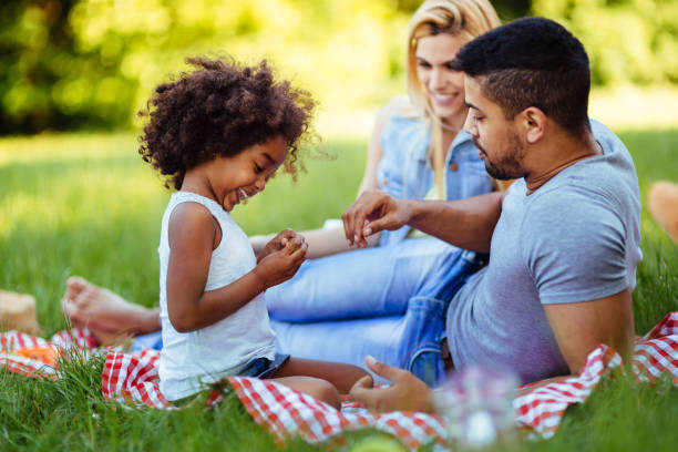 istock Happy family having fun time on picnic 862218872