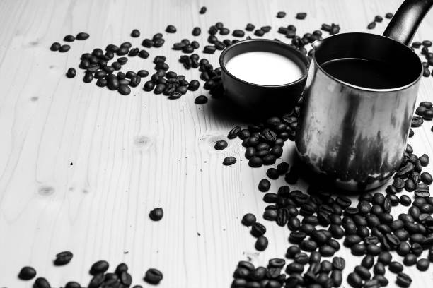 Coffee beans and milk and cookies black and white poster