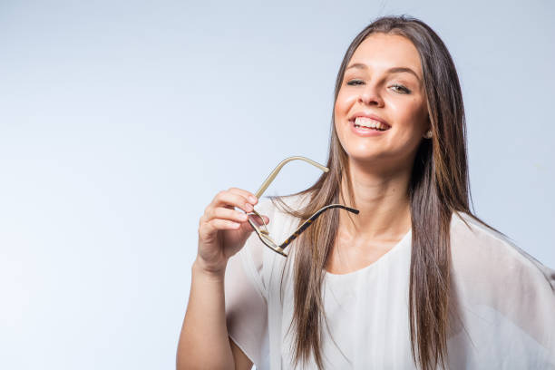 istock Brunette business / professional model wearing reading glasses 862222820