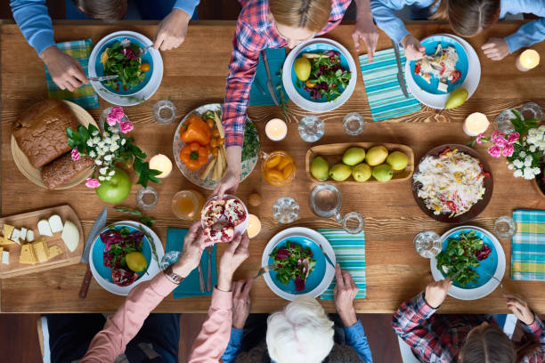 istock Family coming together at dinner 862225696