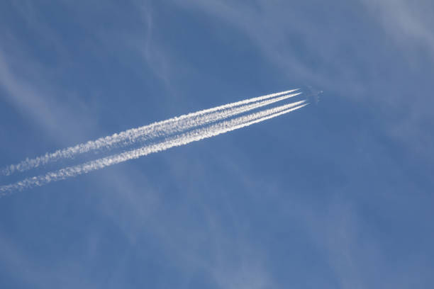istock Plane at cruising altitude against blue sky 862228882